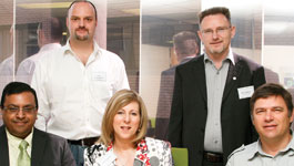 Standing: James Redlinghuys, Neil Cameron. Seated: Maiendra Moodley, Teryl Schroenn, Karel Rode